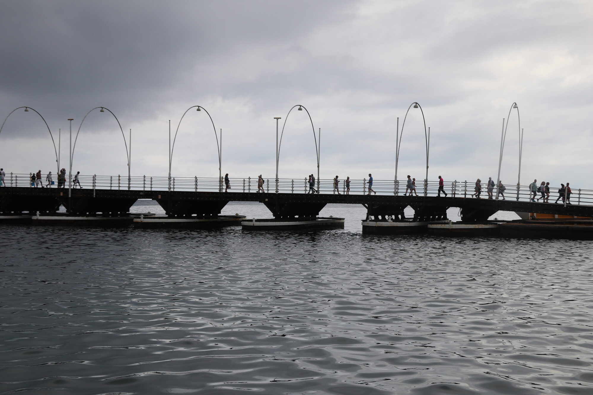Queen Emma pontoon bridge silhouetted with arched lights