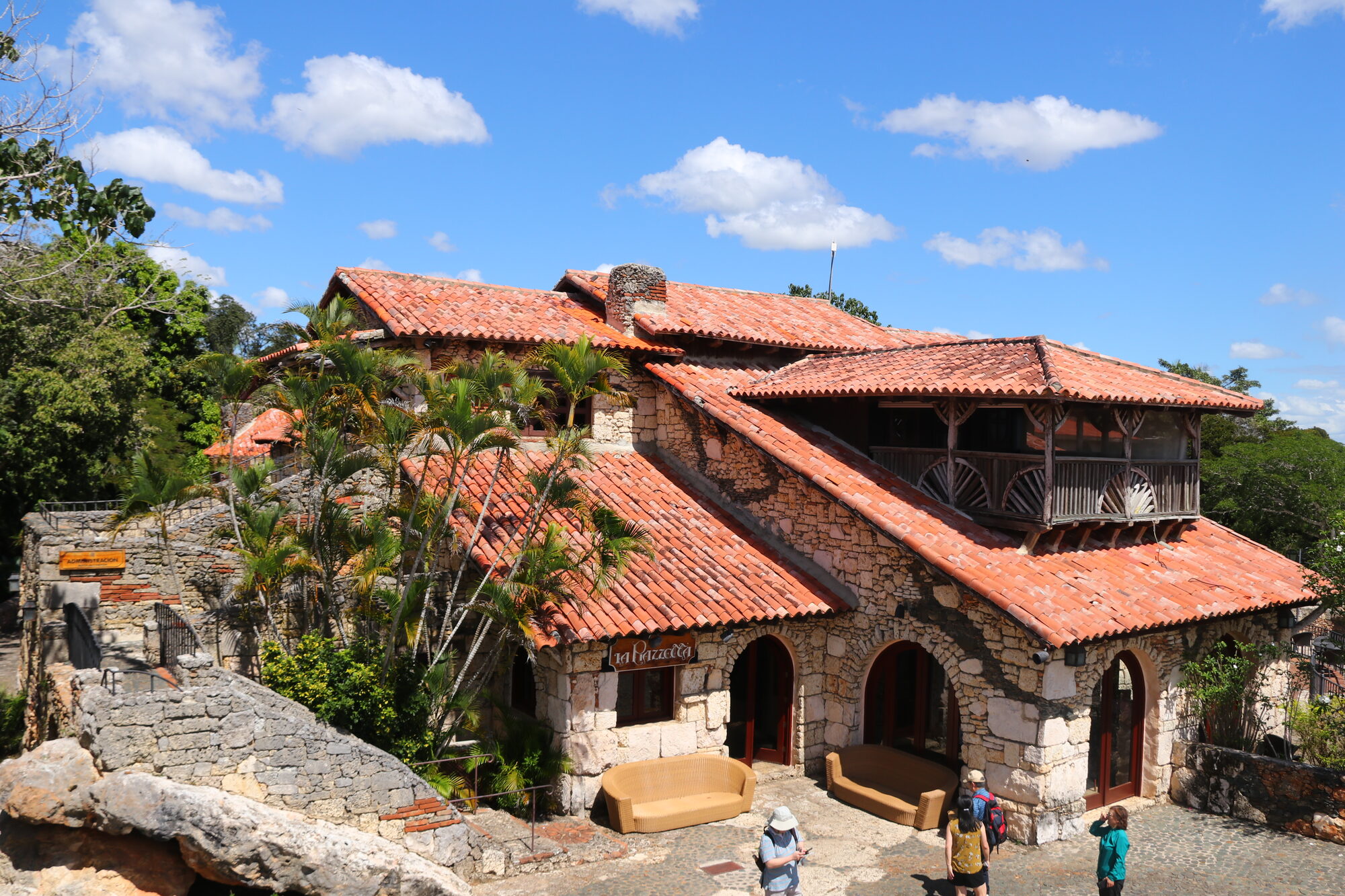 Red-tiled roofs of Altos de Chavón under a blue sky
